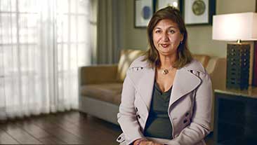 Watch video. Still of Sheena Aurora, MD, speaking on how DHE has evolved for at-home use