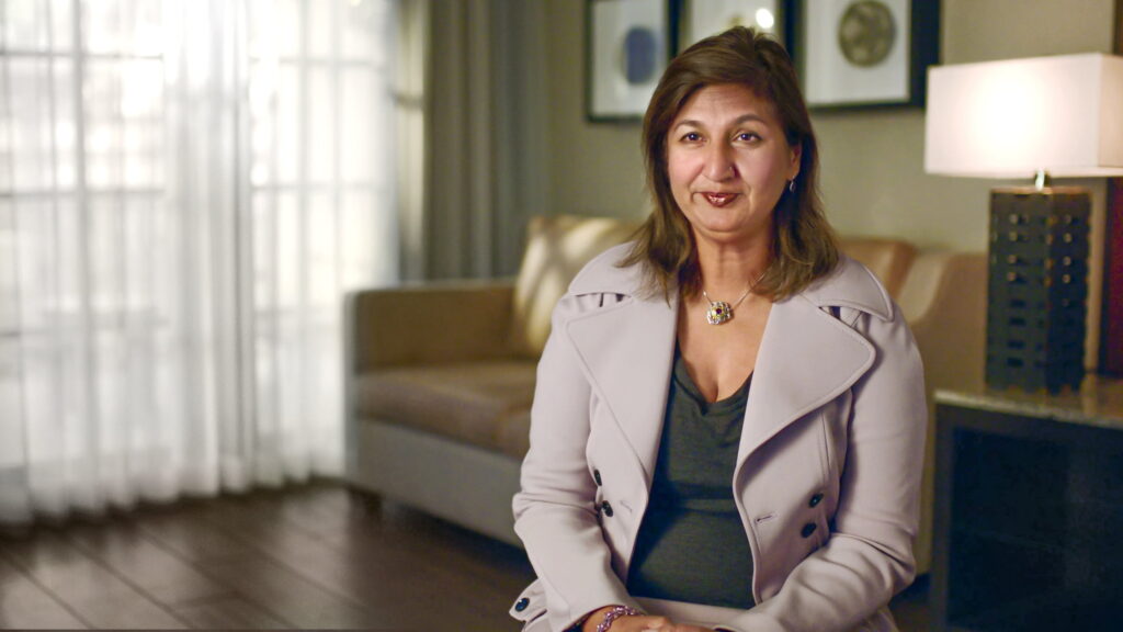 Watch video. Still of Sheena Aurora, MD, speaking about how DHE has evolved for at-home use